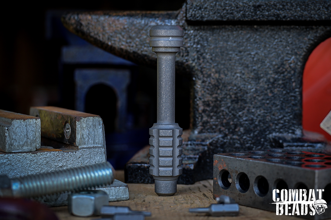 85f6b8_643f38465e264e1abbf9e78e8ffb833d_mv2-1 Combat Beads MK2 Bit Driver Tool Blasted/Tumbled Titan